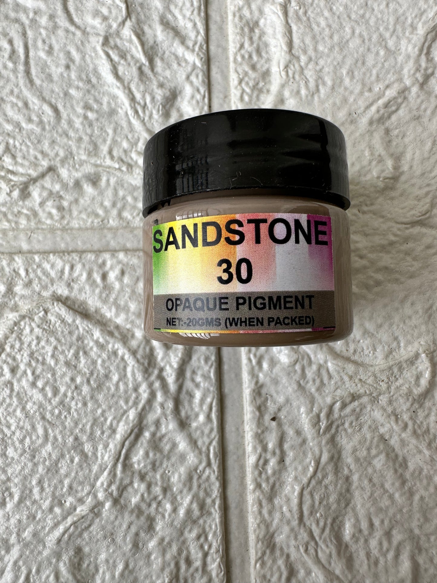 Sand opaque pigment